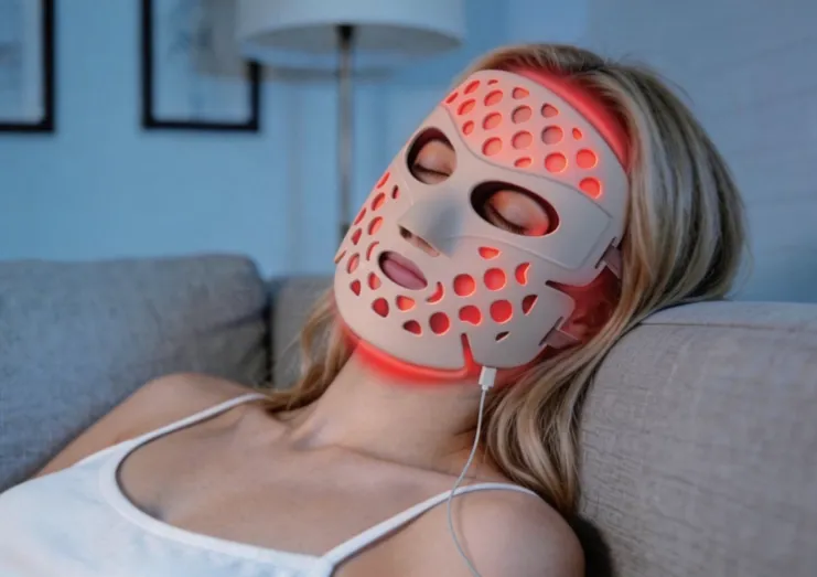 model-wearing-led-light-therapy-mask-home-skincare-routine