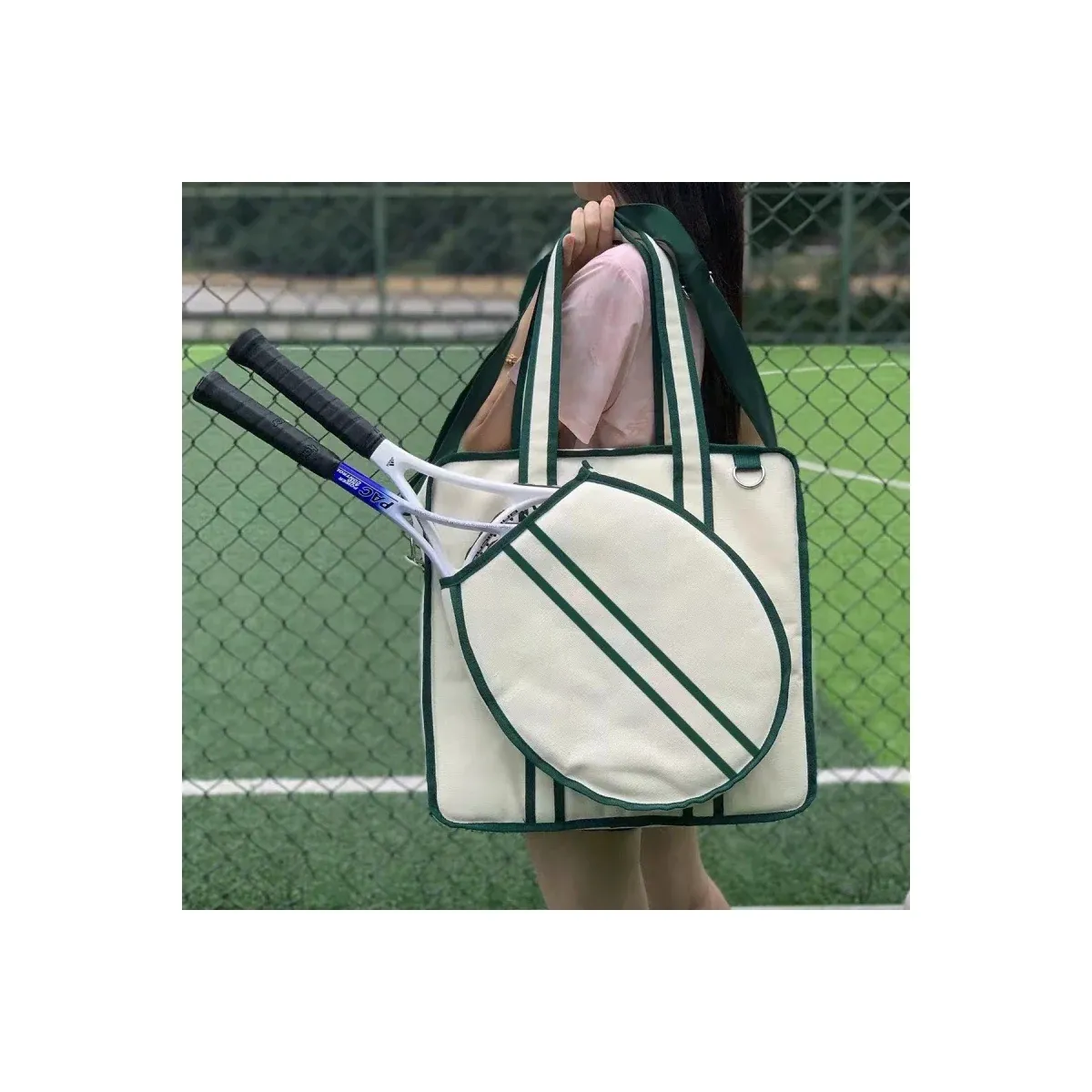 Cream tennis tote with green trim and racket pocket