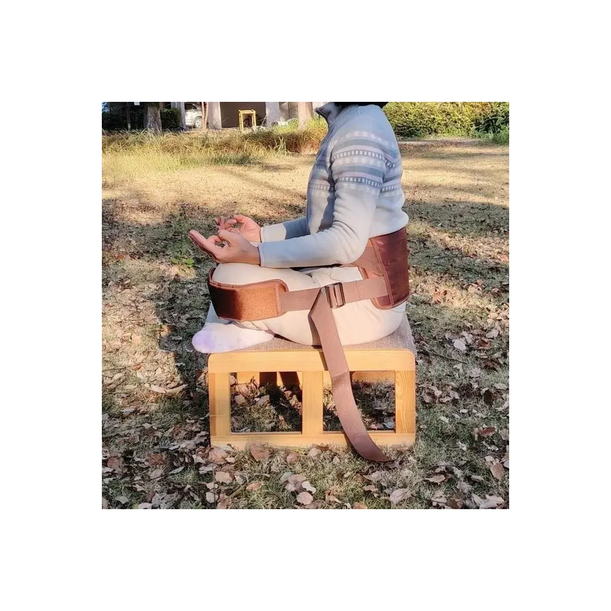 Meditation strap around the waist while seated