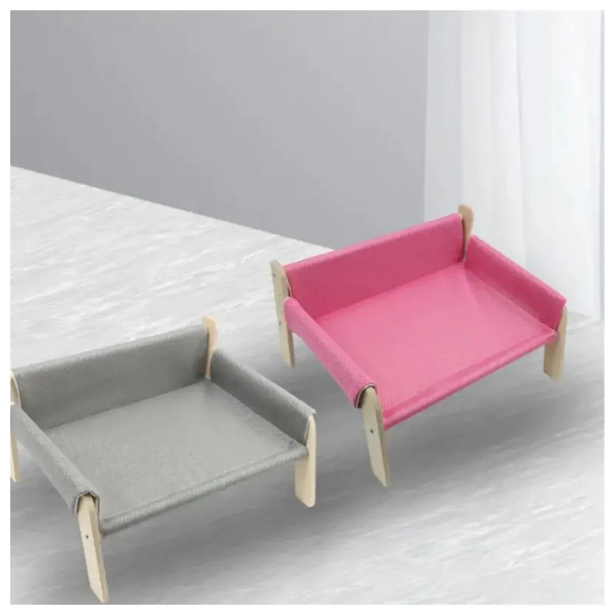 Pink and grey raised pet beds