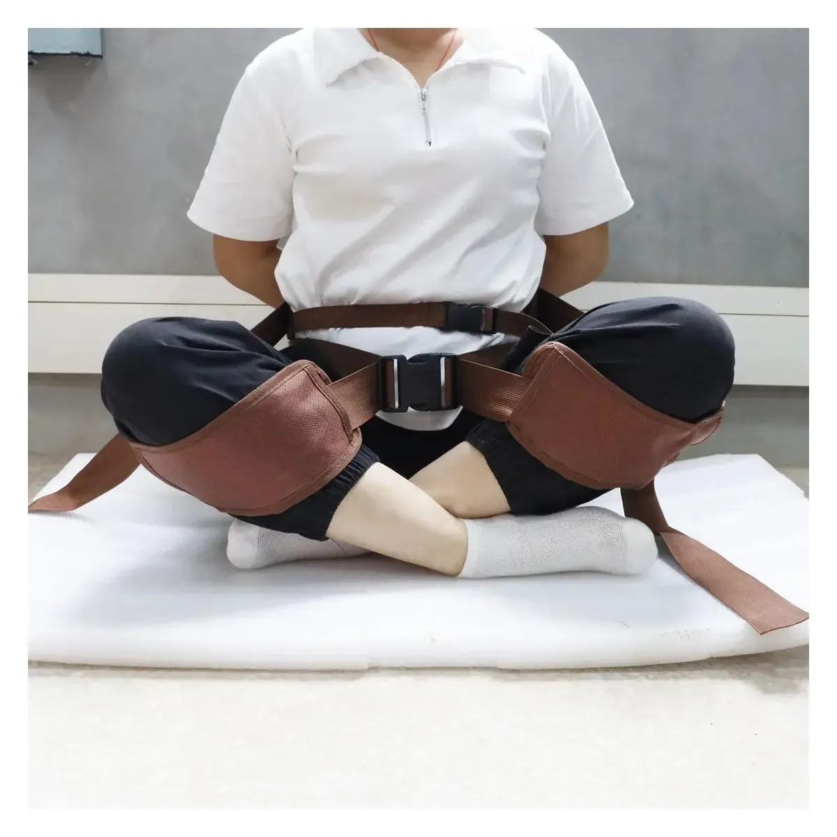 Meditation strap used in a cross-legged seated position