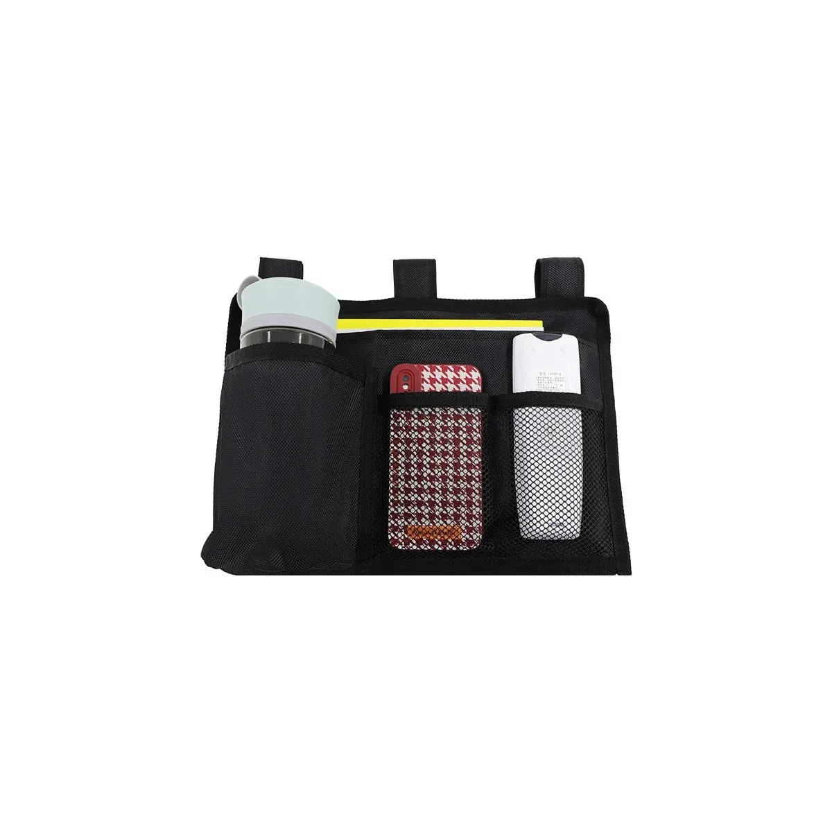 Bedside storage bag holding a bottle, phone and remote