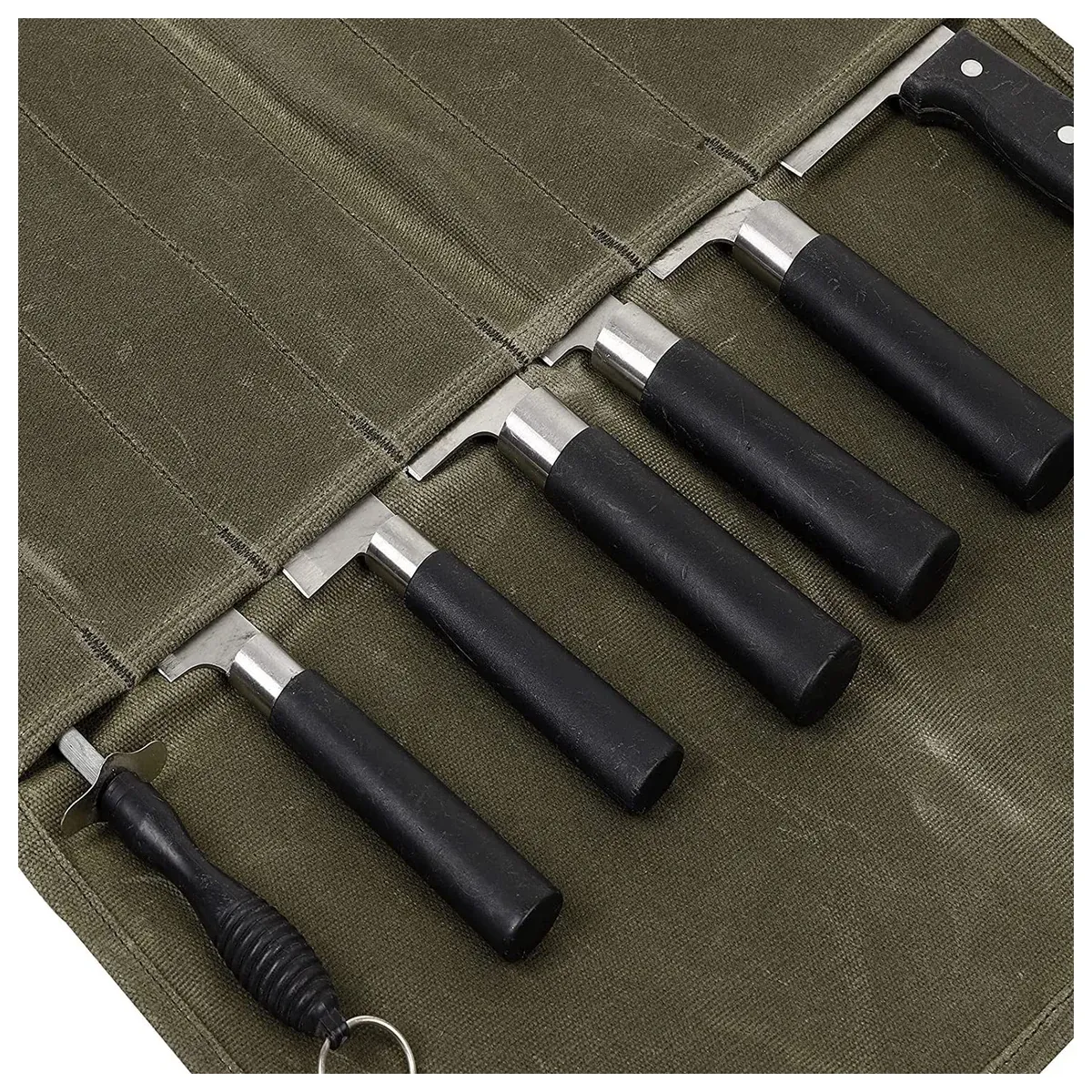 Seven knife slots in a waxed canvas roll