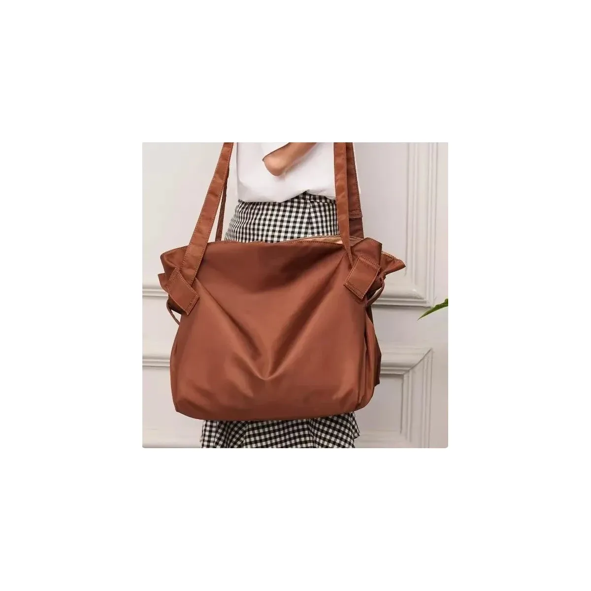 Brown nylon camping tote with long shoulder straps