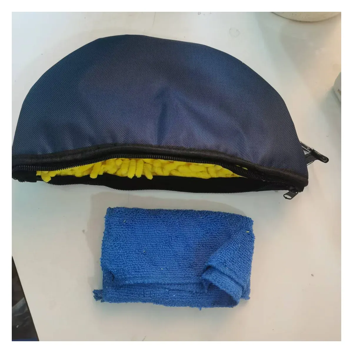 Frisbee cleaning bag open with cloths