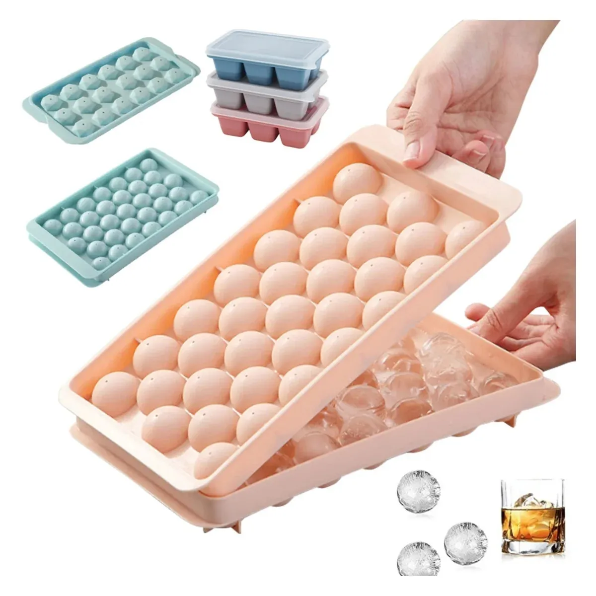 Ice ball tray in pink and blue with round ice spheres