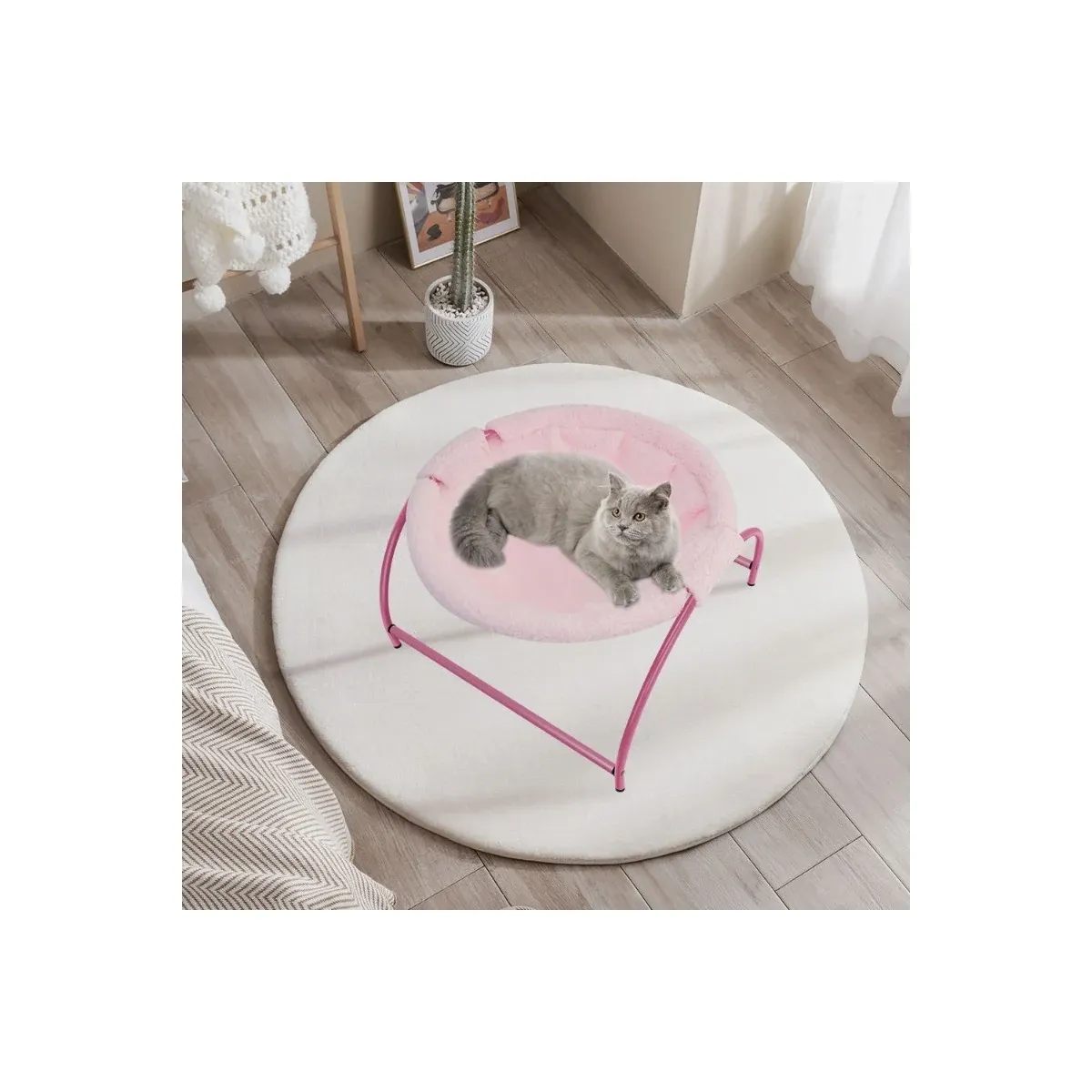 Pink cat hammock bed in a room