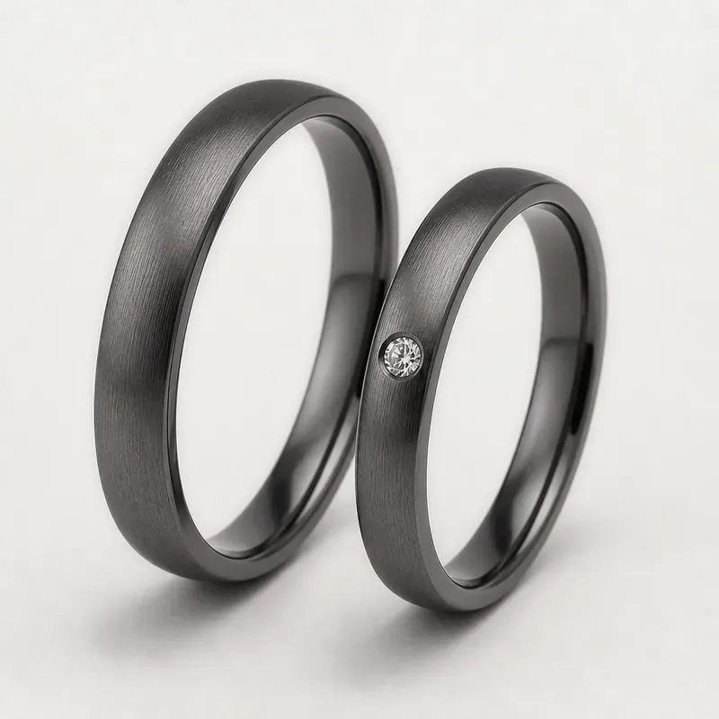 tantalum couple rings with brushed dark-toned bands with a single-stone accent on one ring, FKS-TA-009