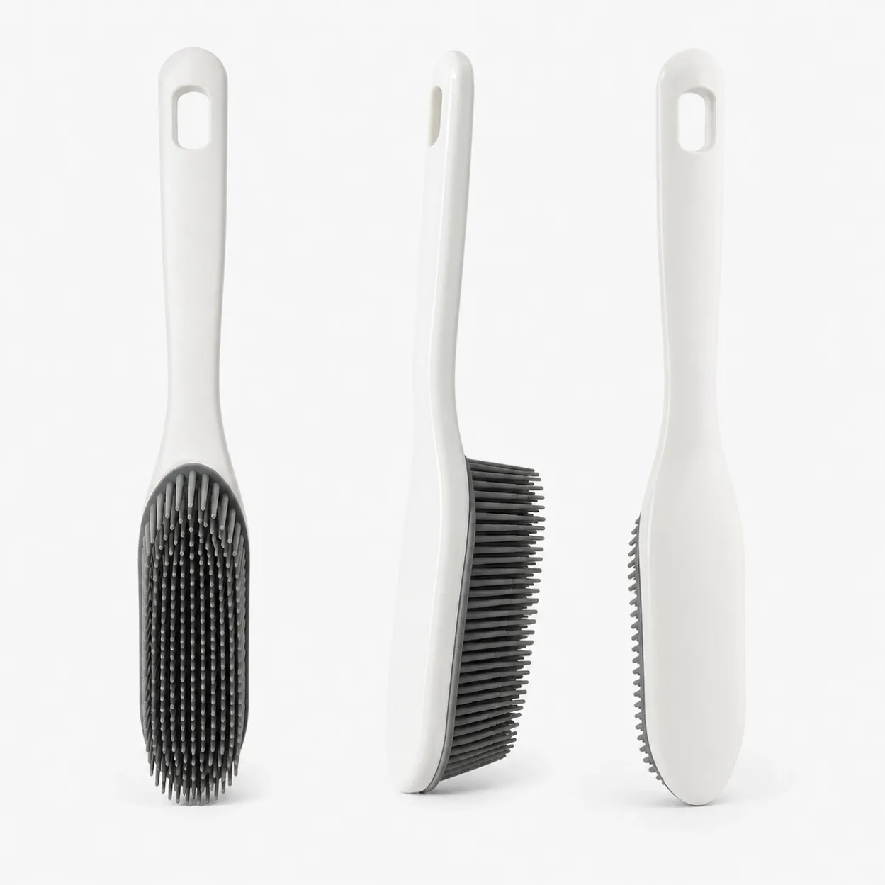 Multi-angle view of long handle pet hair cleaning brush for sofa and carpet.