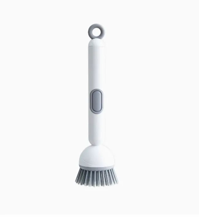 Rotating Liquid Dispensing Dish Brush on a clean white background