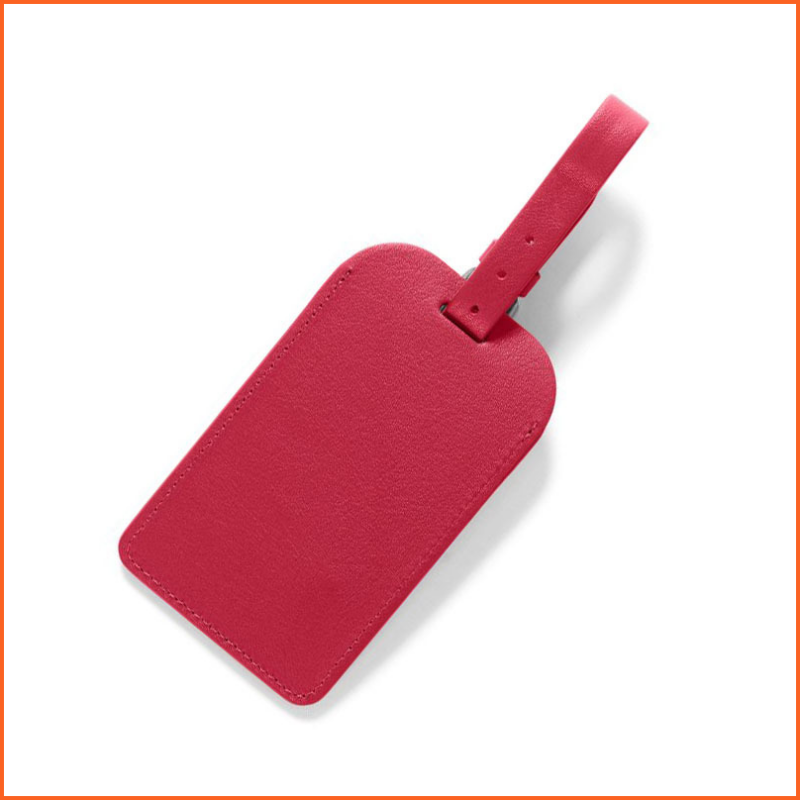 red luggage tag 1