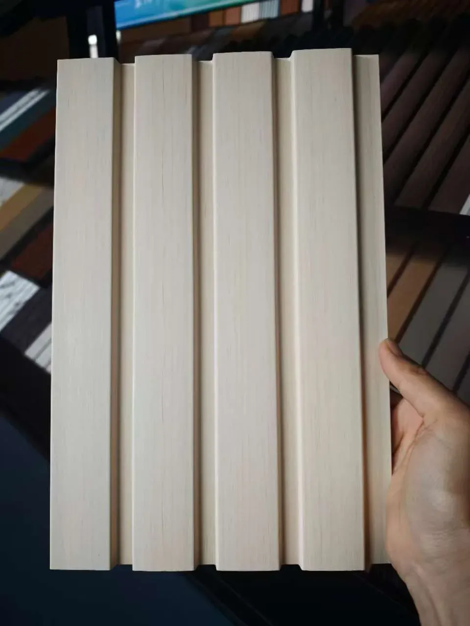 Off-white 3D wave fluted wall panel sample showing the square-top and arc-top repeat