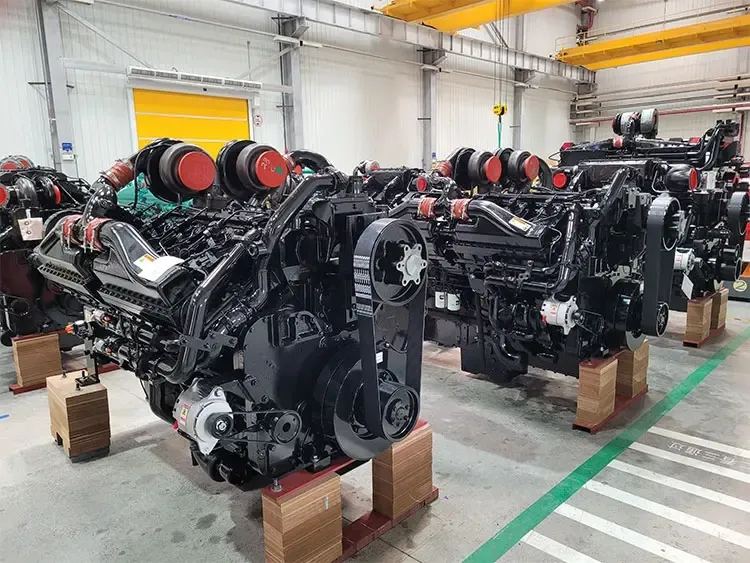 Cummins diesel engine for a concrete pump truck, on the workshop floor, tagged for nameplate and load-test verification before export