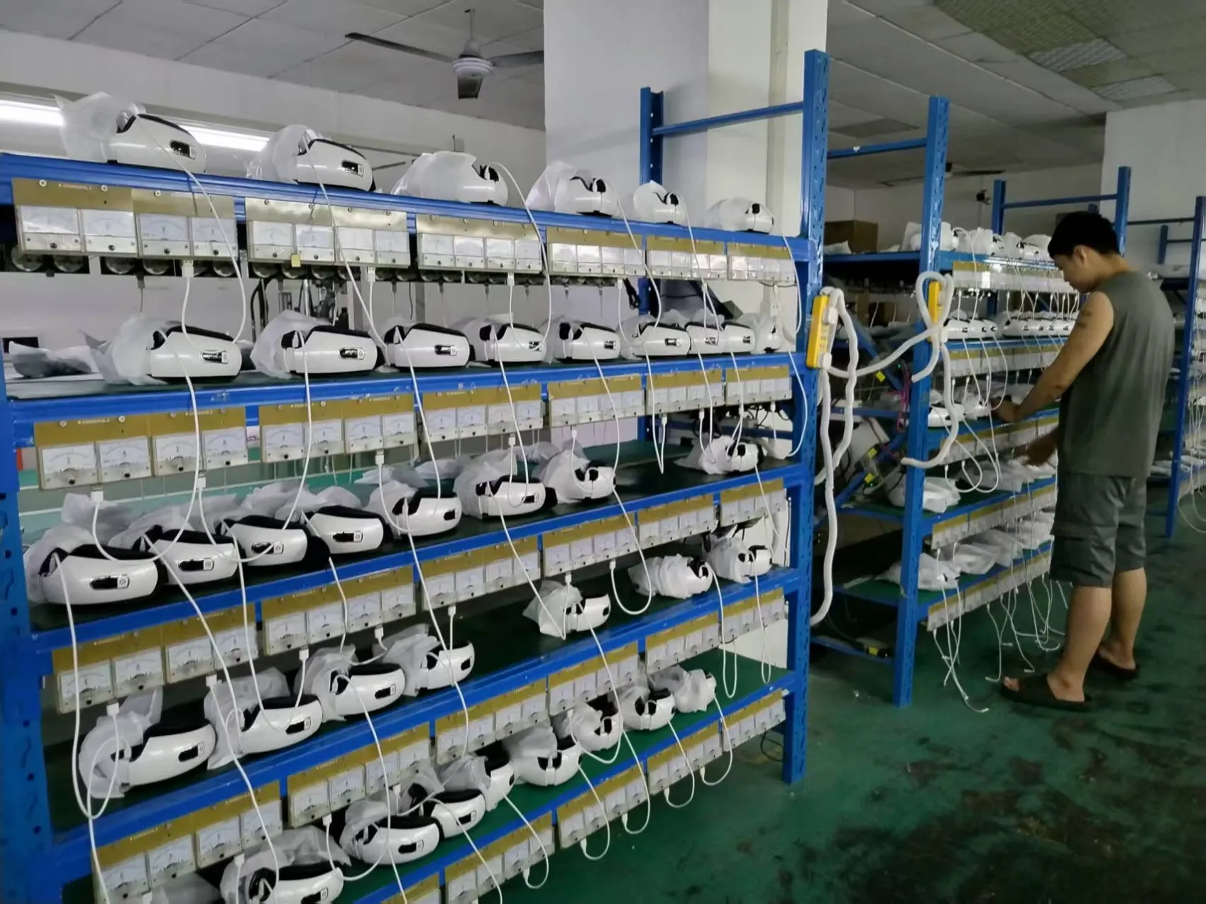 Massager aging test station running continuous endurance testing in factory