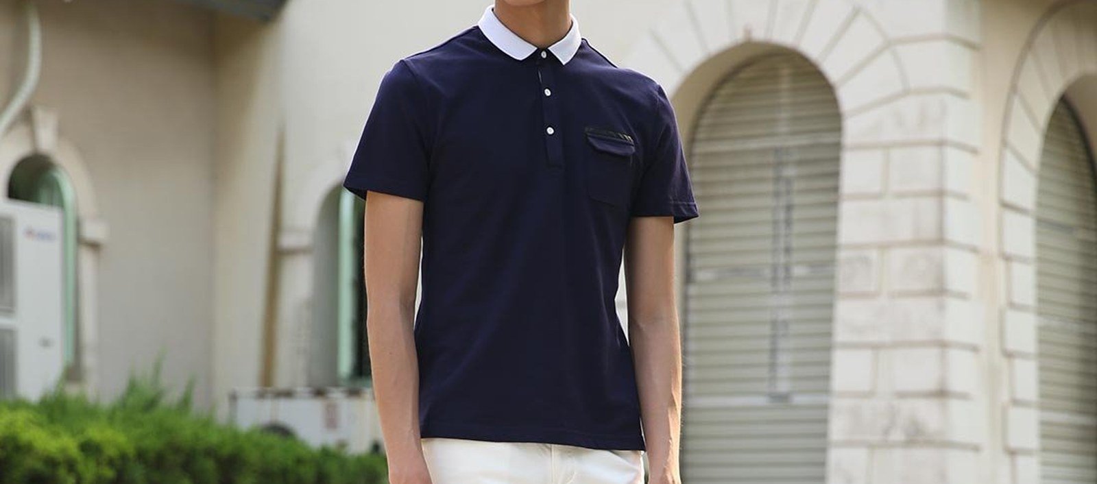 Navy pique polo shirt with white contrast collar