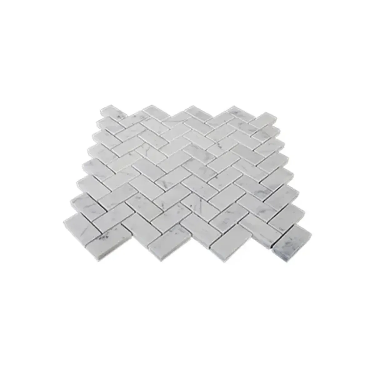 Close-up of Carrara White Marble 1x2 Inch Herringbone Mosaic Tile surface and joints