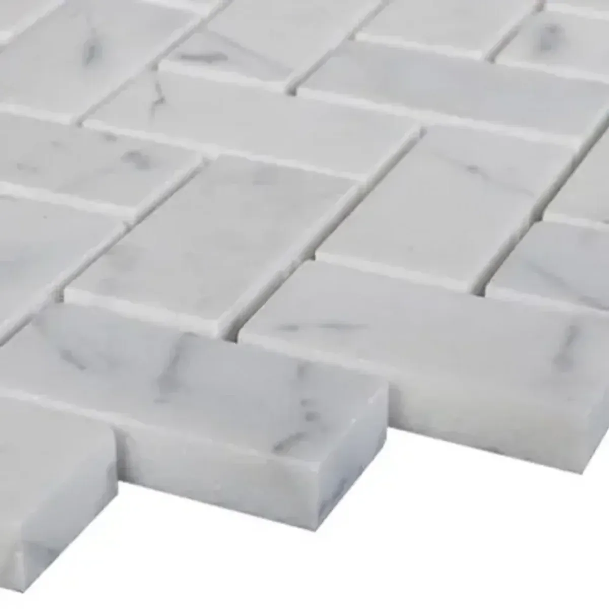 Carrara White Marble 1x2 Inch Herringbone Mosaic Tile sheet showing consistent herringbone geometry