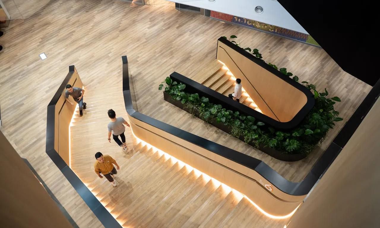 Curved metal stair cladding at a technology office