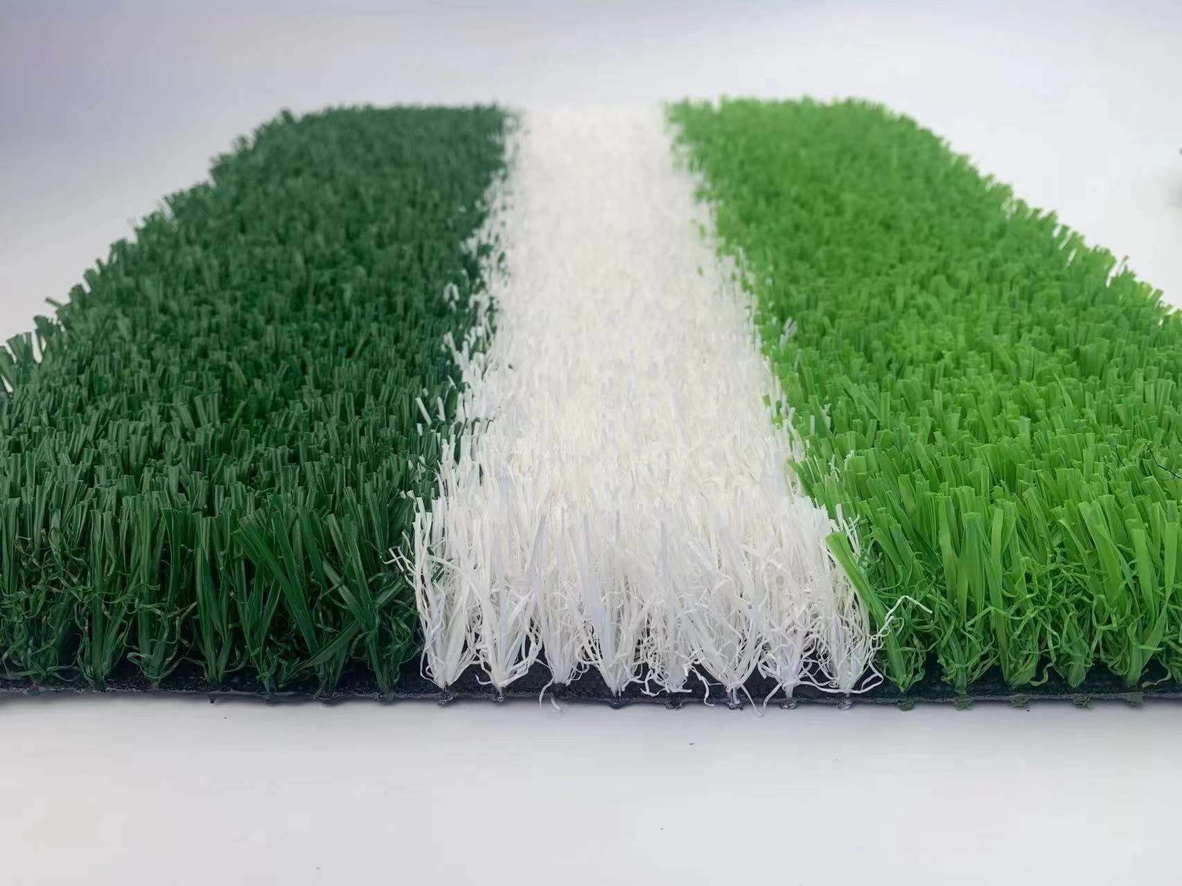 Non-fill artificial football turf with line marking