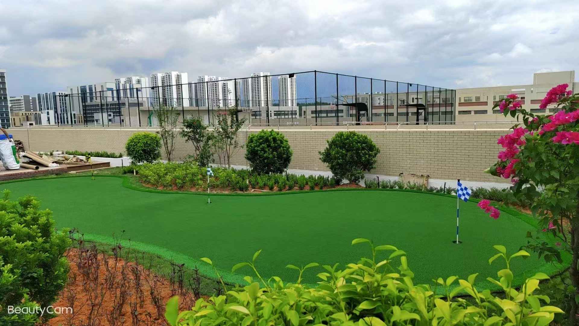 Curly yarn artificial turf on a golf putting green