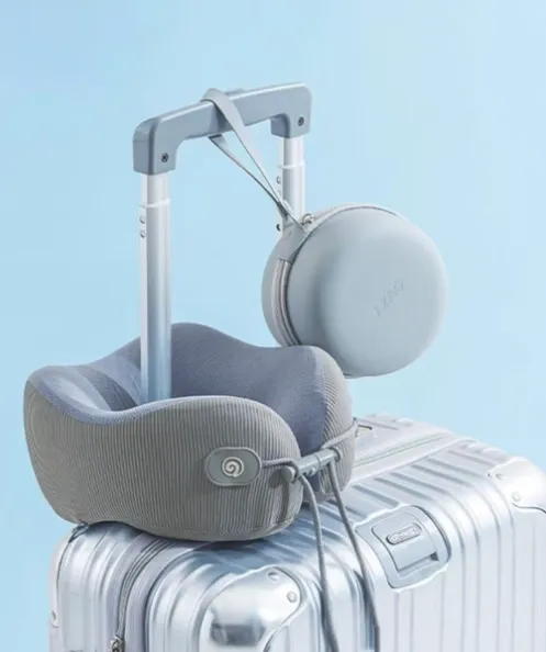 memory foam travel pillow on luggage