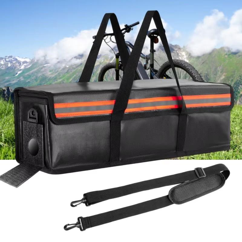 Black E02 e-bike battery bag with orange reflective stripe and detachable shoulder strap