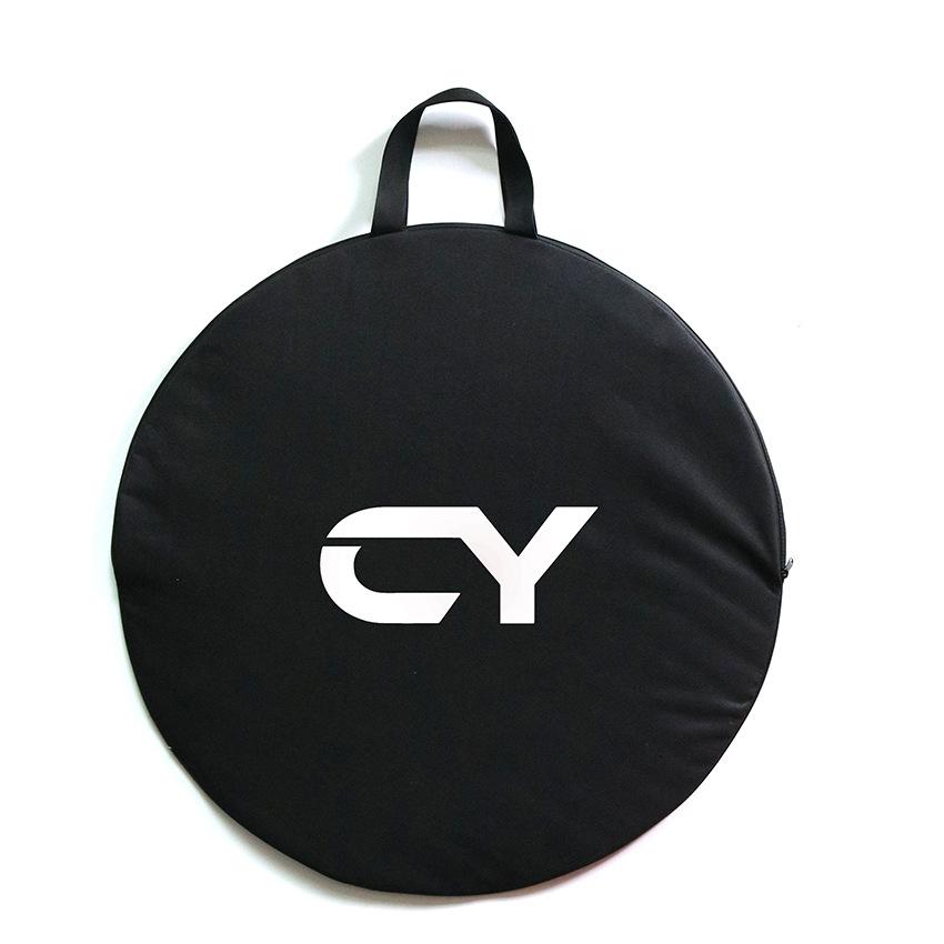 Black KY038 round wheel bag with carry handle and white CY logo, front product view