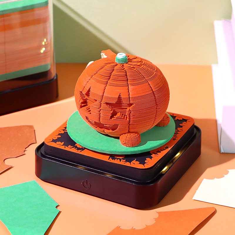 Halloween pumpkin 3D memo pad with carved face on LED base