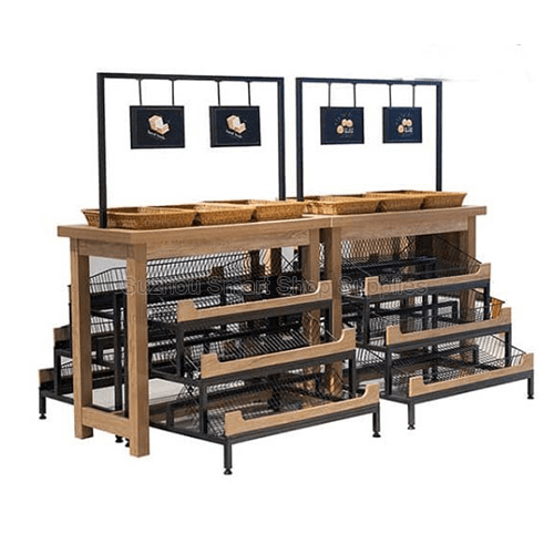Heavy-duty commercial double-sided bakery island display SMT-BD06 featuring tiered wire mesh baskets, wooden top shelf, and overhead signage frames