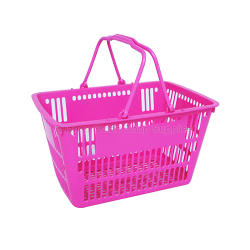 Compact 16L lightweight ventilated plastic shopping basket SMT-HB03 by Suzhou Smart Shop Supplies in vibrant pink featuring drop-down dual handles