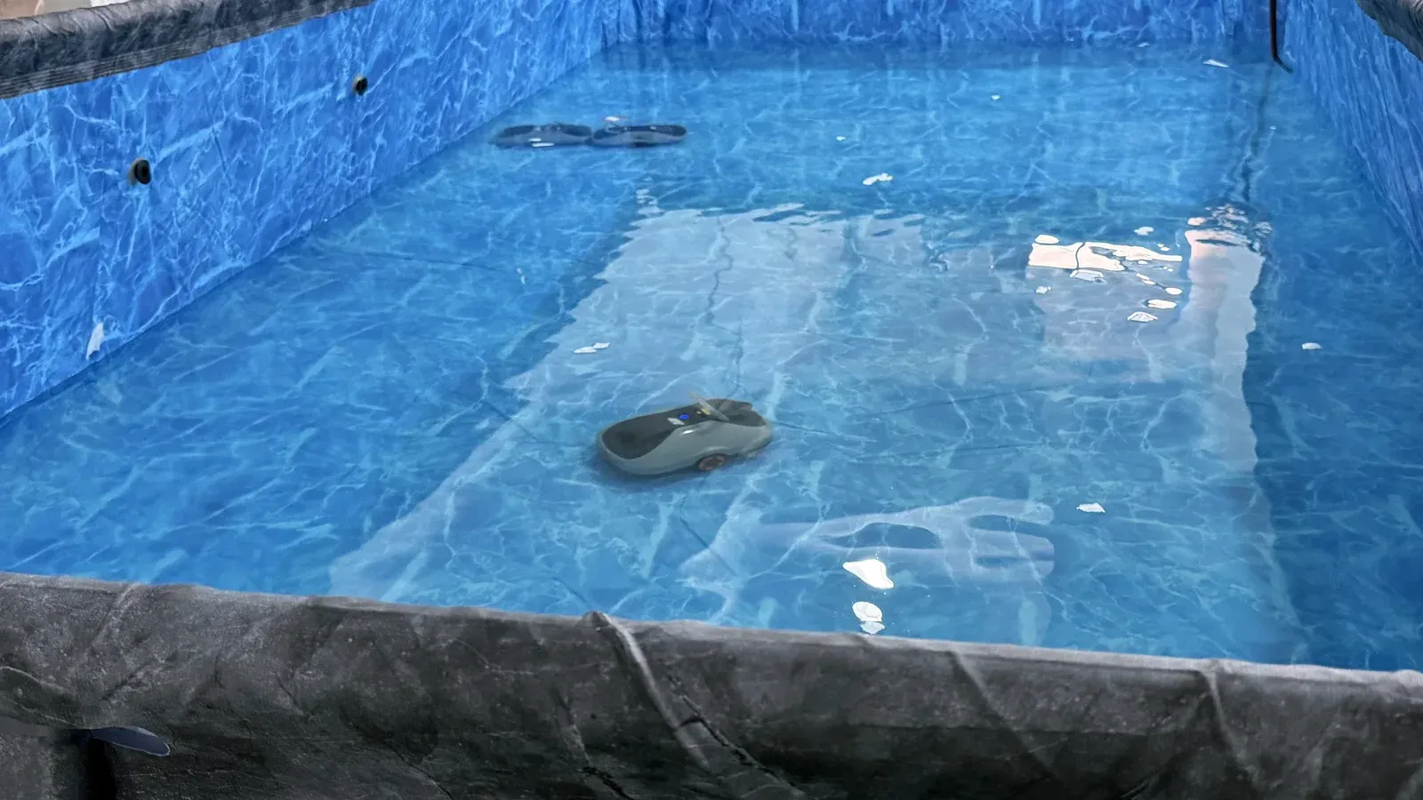 A pool robot running in the in-water test tank at our Changzhou factory