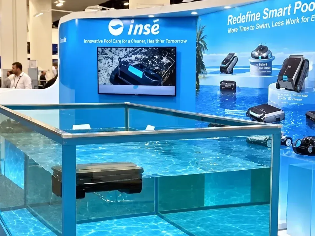 Pool robots in a water tank at a Silver Home trade show booth