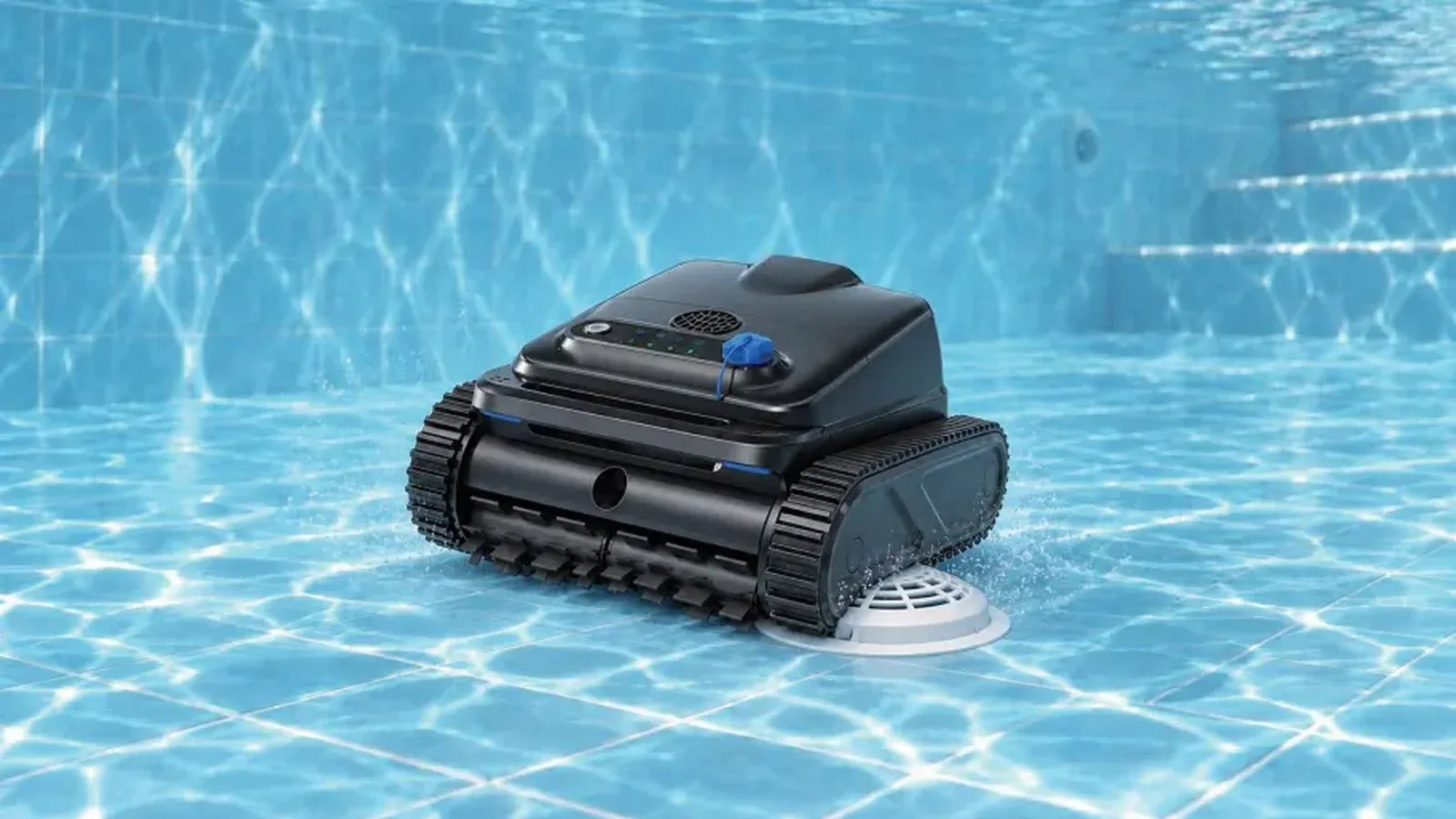 Cordless robotic pool cleaner on a tiled pool floor