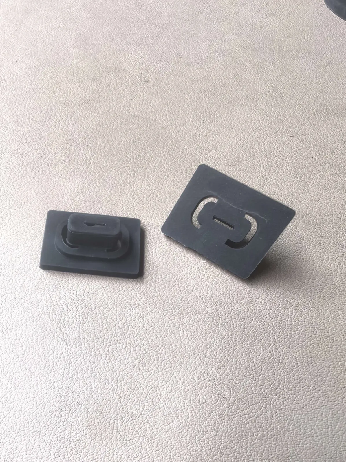 Self-adhesive rubber cable clips with C-shaped opening