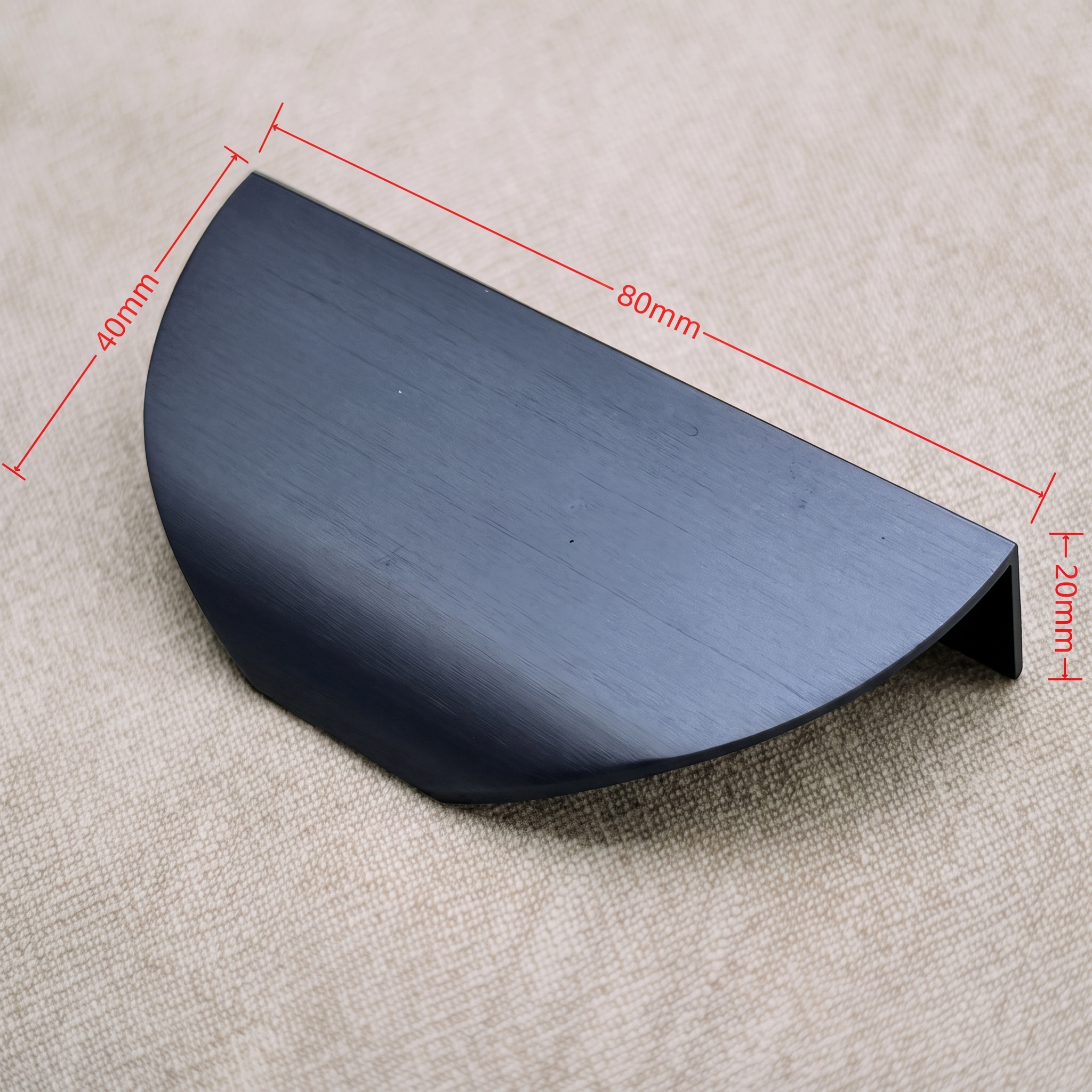 Dimension photo of a matt black half-moon edge pull on pale linen, annotated 80 mm length, 40 mm width and 20 mm profile height