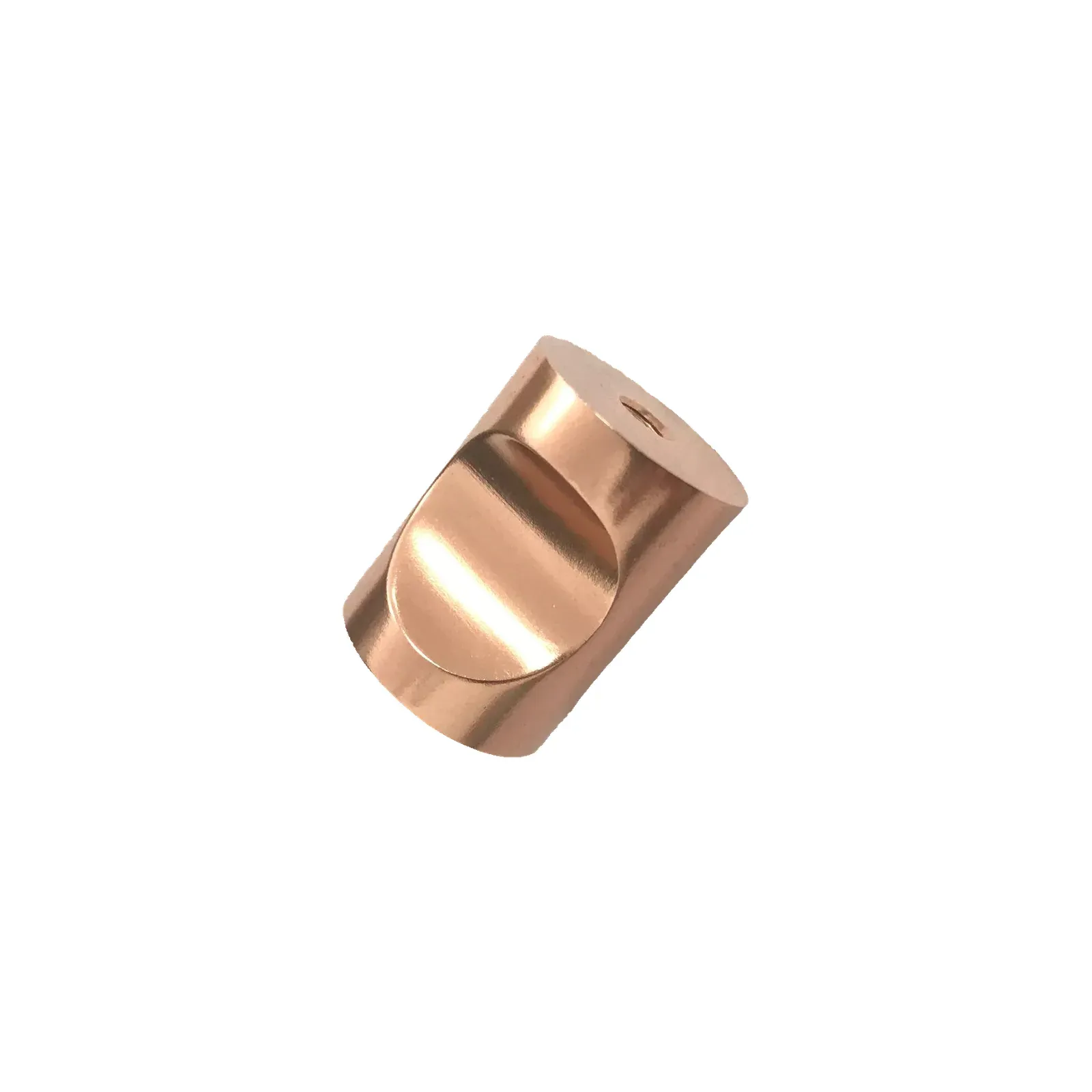 Diagonal view of the rose gold barrel cabinet knob tilted to show both its circular finger scoop and flat end face