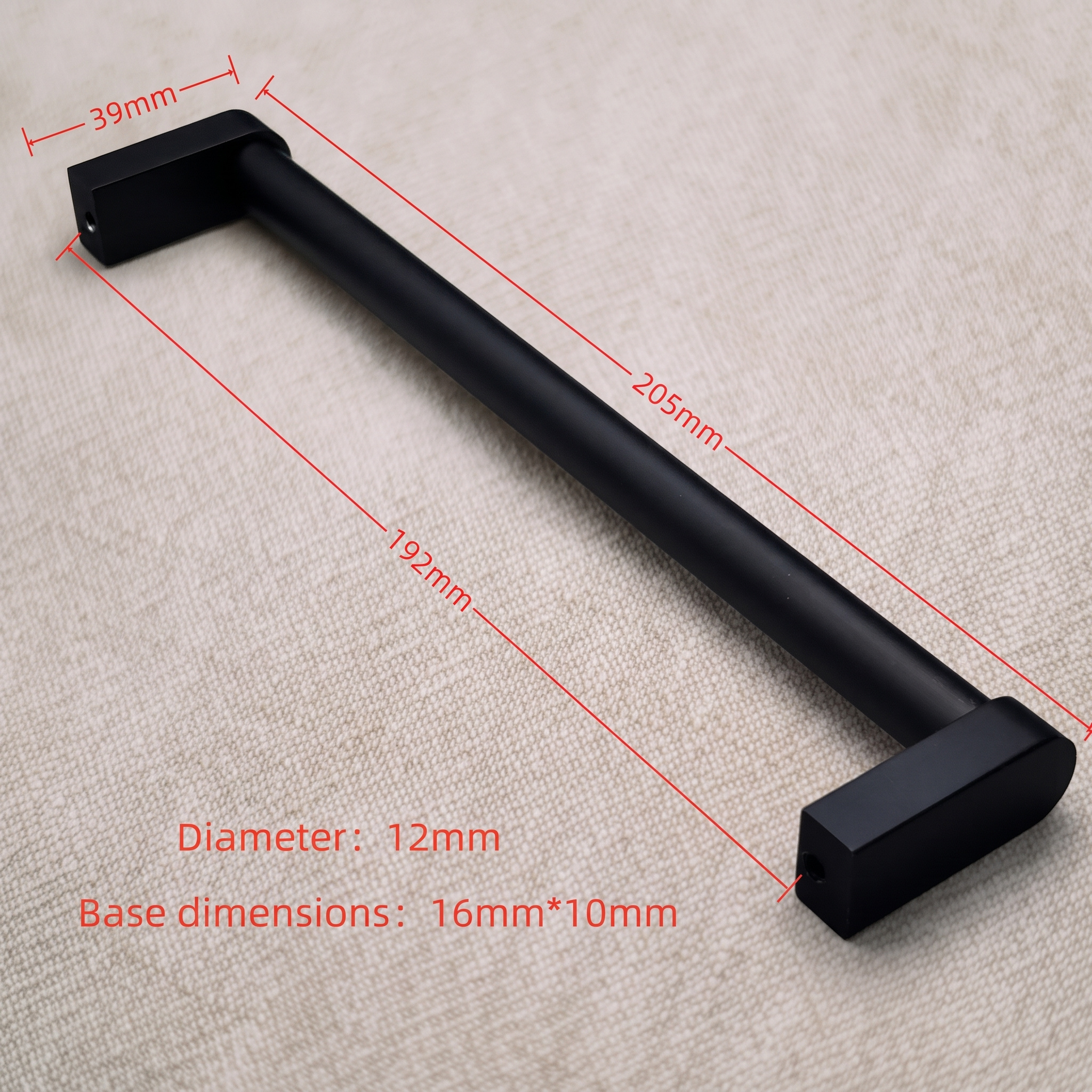 Dimension drawing of the smooth cylindrical aluminum bar pull photographed on pale linen, with red callouts for projection, overall length, center-to-center spacing, bar diameter, and base size