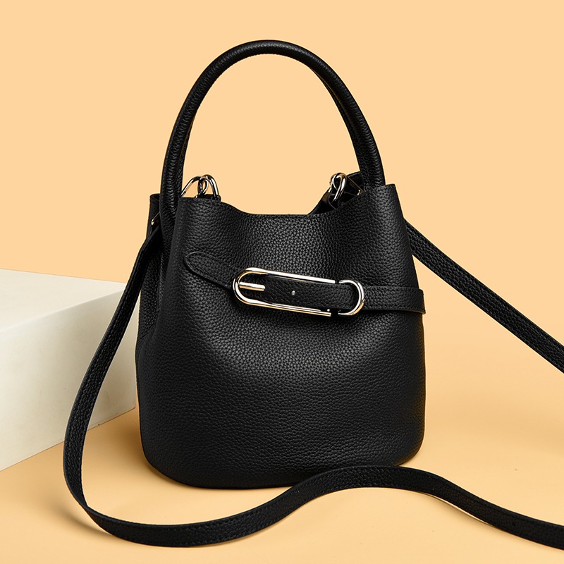 Custom Leather Bucket Bag – Drawstring Handbag with Metal Bar Detail — custom leather bag manufacturing by Kaishi Bag Factory