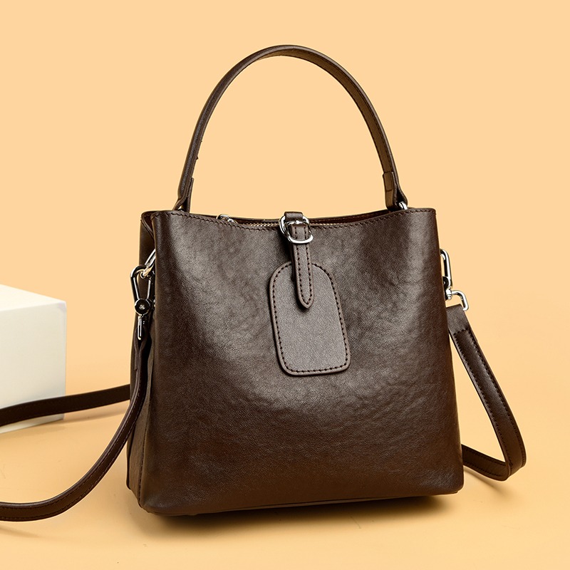 Custom Leather Bucket Bag – Shoulder Bag with Tassel Detail (view 2) — custom leather bag manufacturing by Kaishi Bag Factory