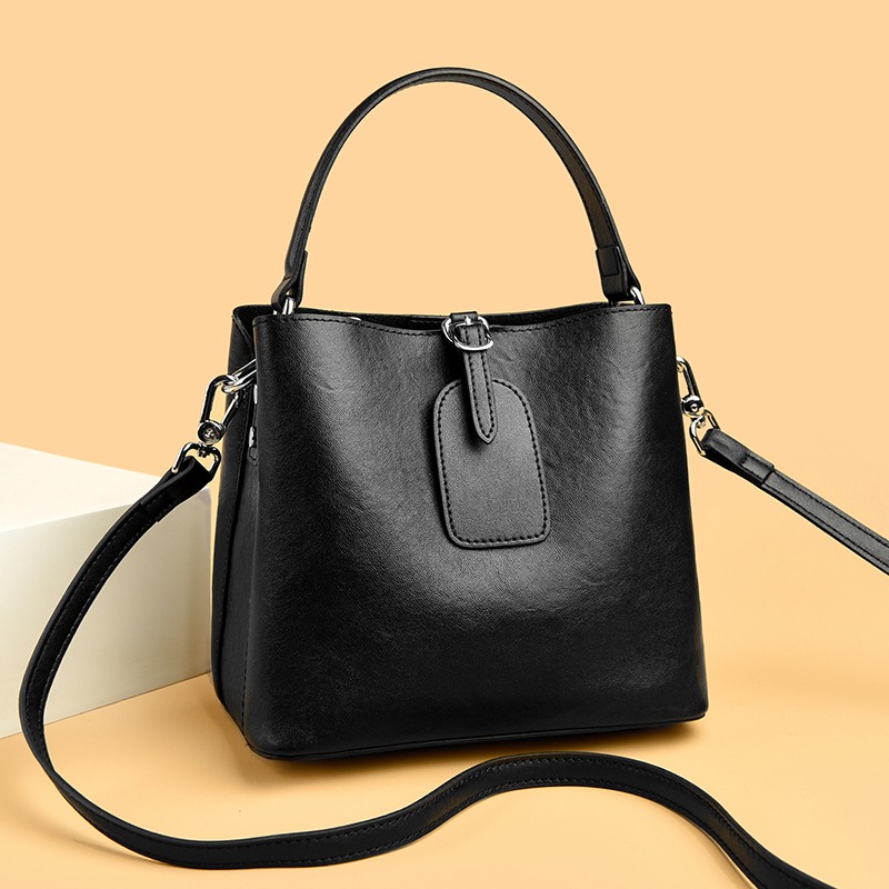 Custom Leather Bucket Bag – Shoulder Bag with Tassel Detail — custom leather bag manufacturing by Kaishi Bag Factory