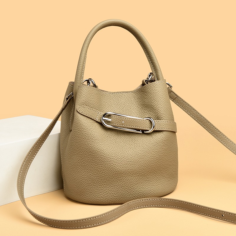 Custom Leather Bucket Bag – Drawstring Handbag with Metal Bar Detail (view 2) — custom leather bag manufacturing by Kaishi Bag Factory