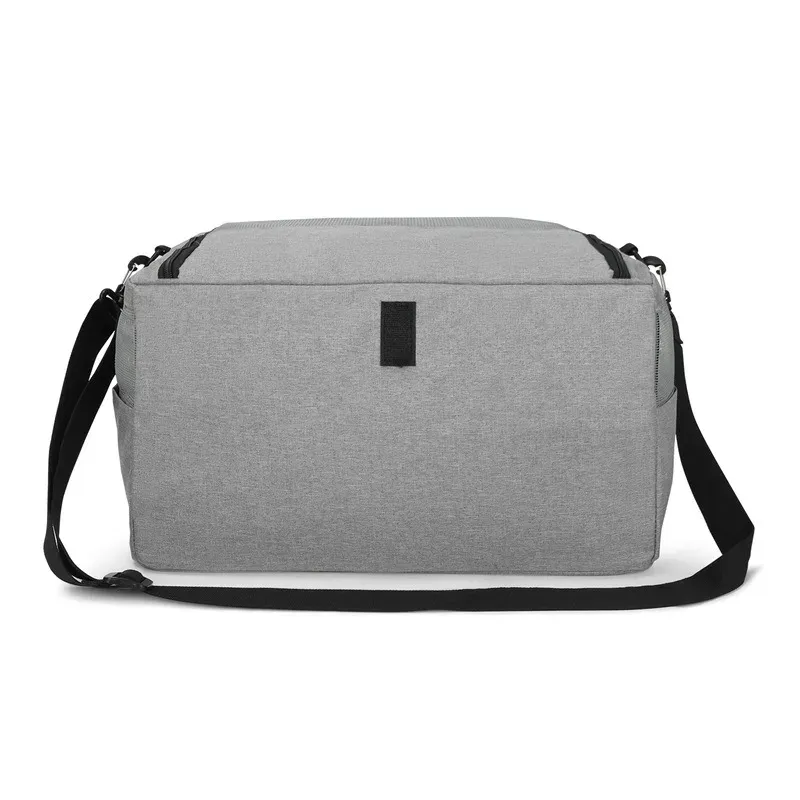 Grey pet carrier bag seen from the long side with its shoulder strap attached