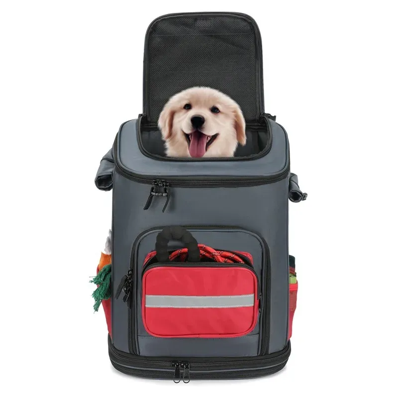 Dark grey and red pet backpack standing upright with a puppy looking out of the top