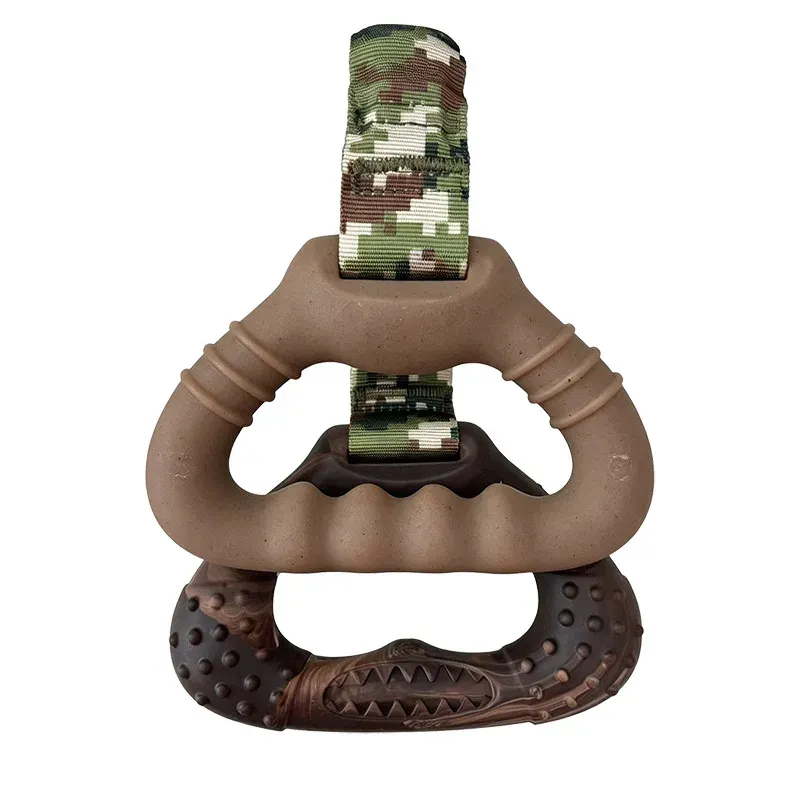 Brown rubber dog tug toy with camouflage strap and a textured rubber grip