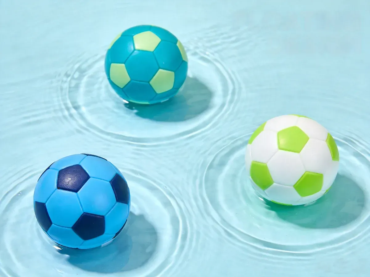 Soccer style floating balls on water