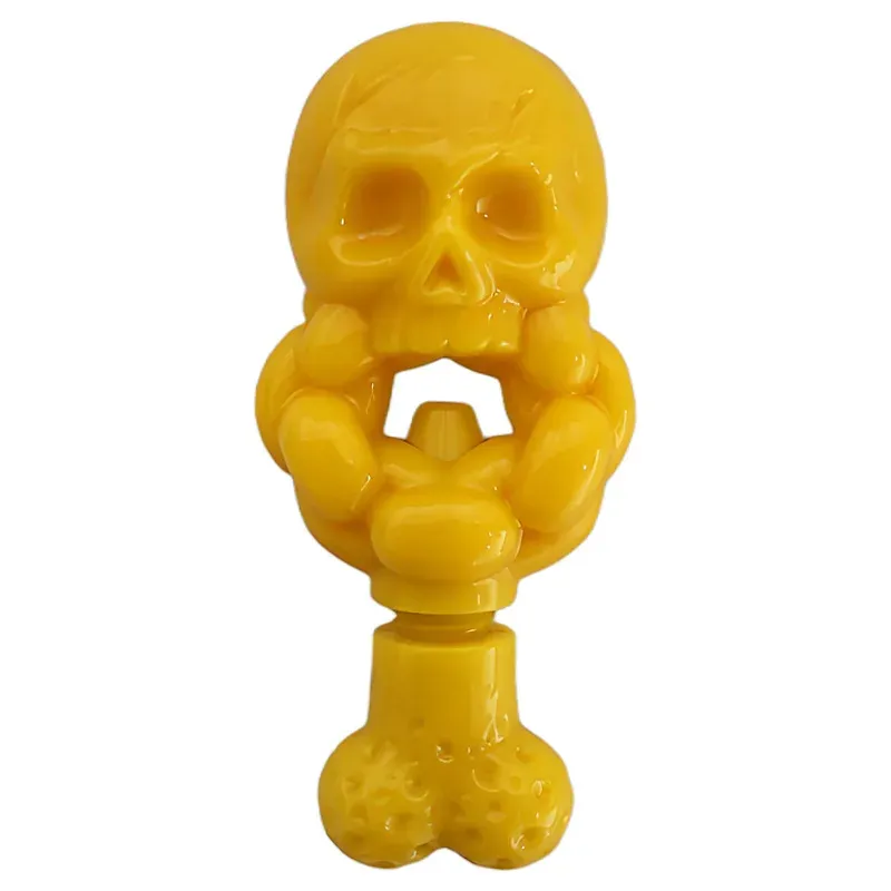 Yellow skull-shaped nylon chew toy