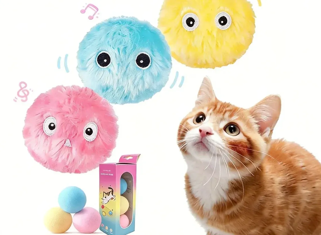 Colorful plush cat toy balls with cat on clean background