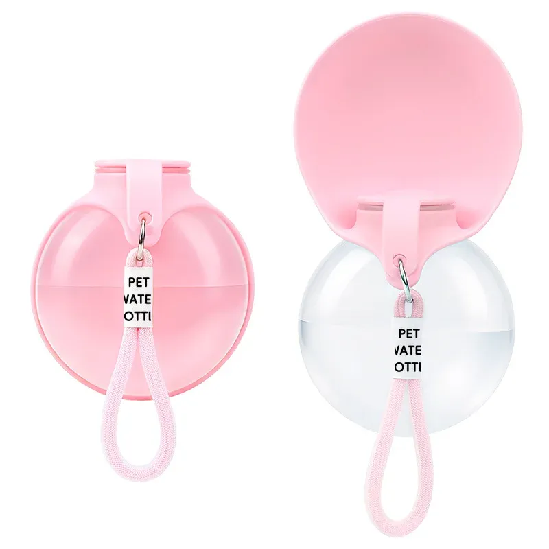 Pink round pet water bottle shown closed and with its round lid flipped open