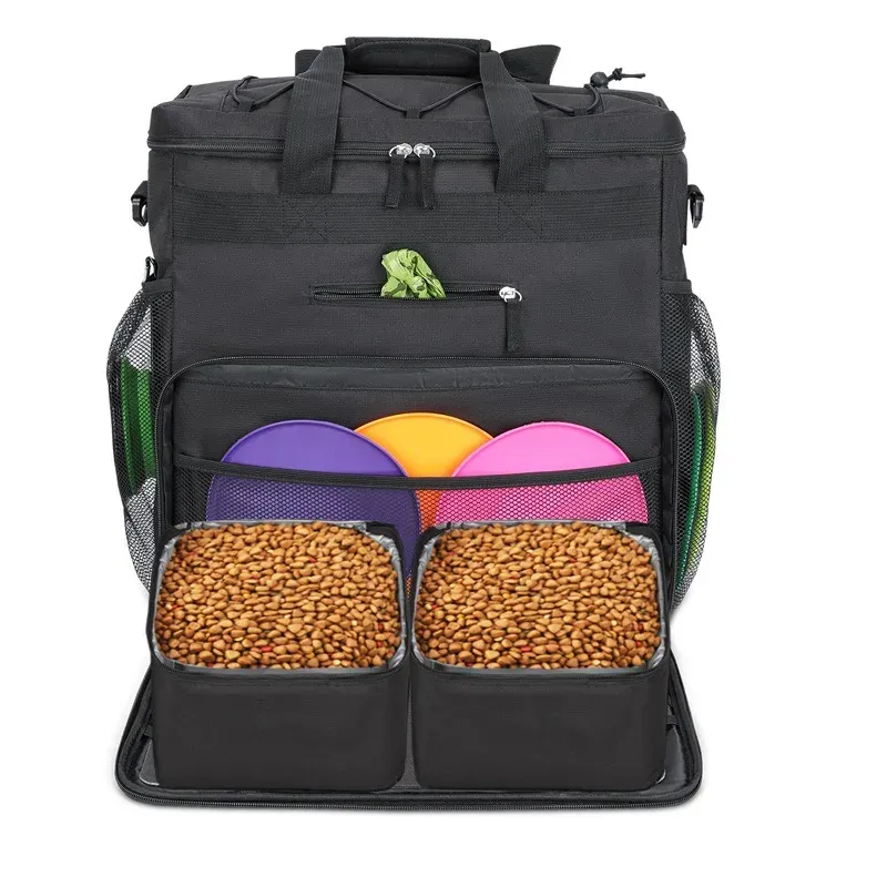 Black rolling pet travel bag with food bowls and kibble in its open front pockets