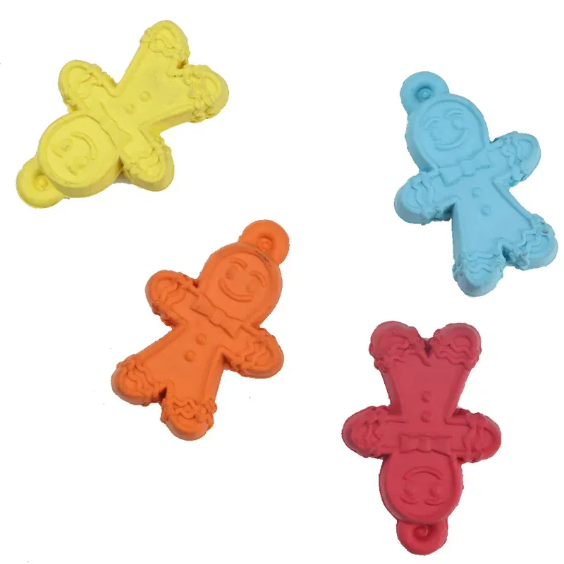 Four gingerbread-man shaped squeaky dog toys in yellow, orange, blue and dark red